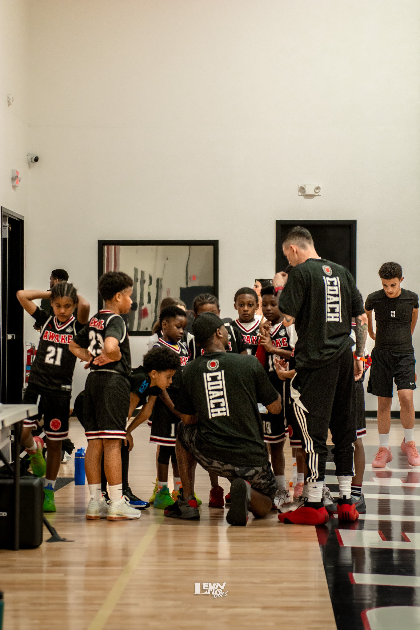 Coaches talking to the team during a timeout