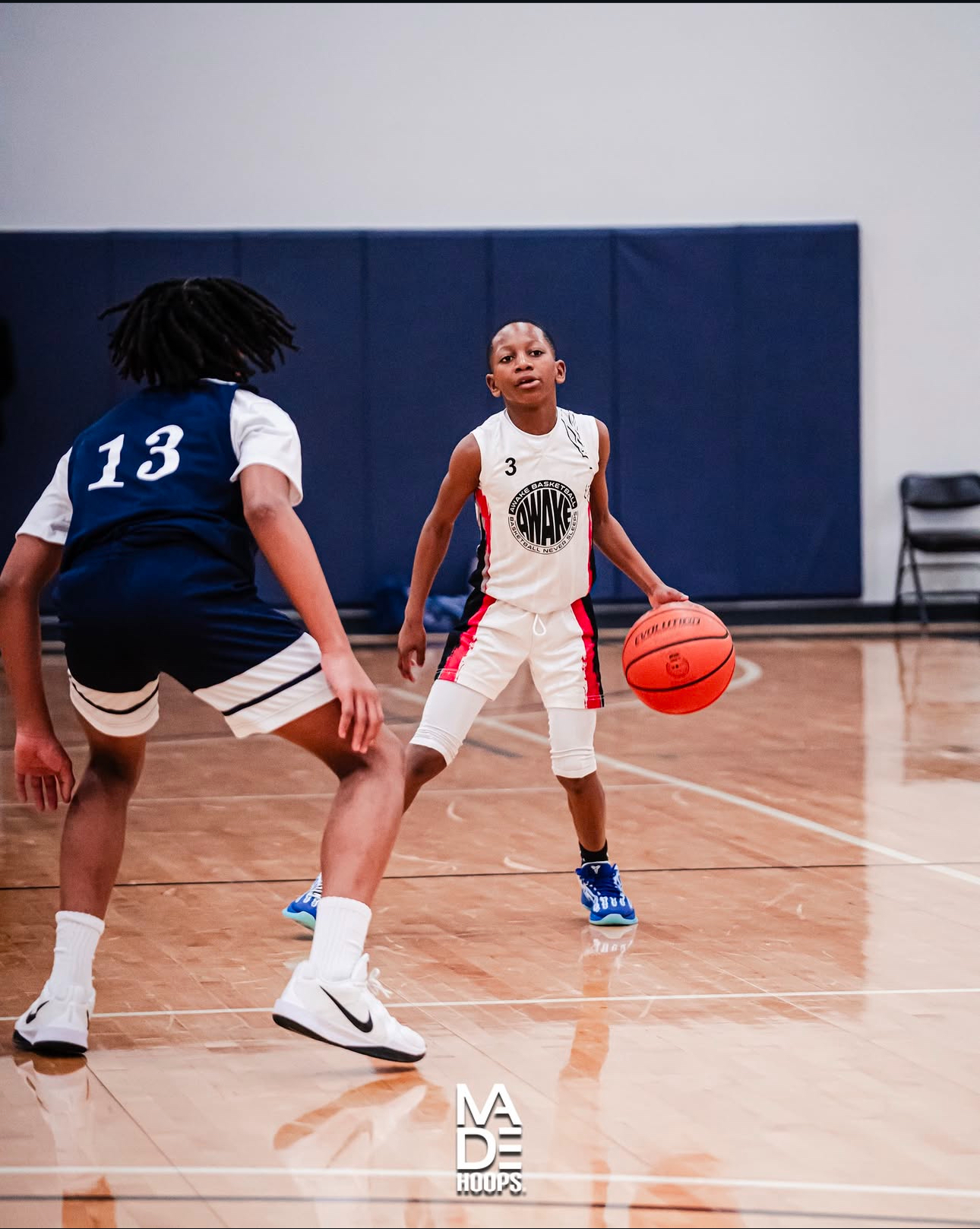 AWAKE guard sizing up a defender